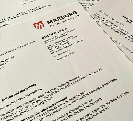 Ein Musterbescheid über einen Antrag auf Sozialhilfe.