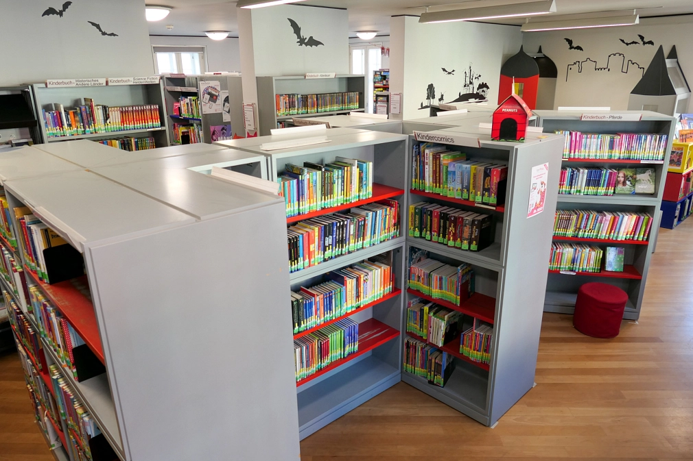 Kinderbücher in der Stadtbücherei Regale mit Kinderbüchern in der Kinderbücherei der Stadtbücherei. © Universitätsstadt Marburg