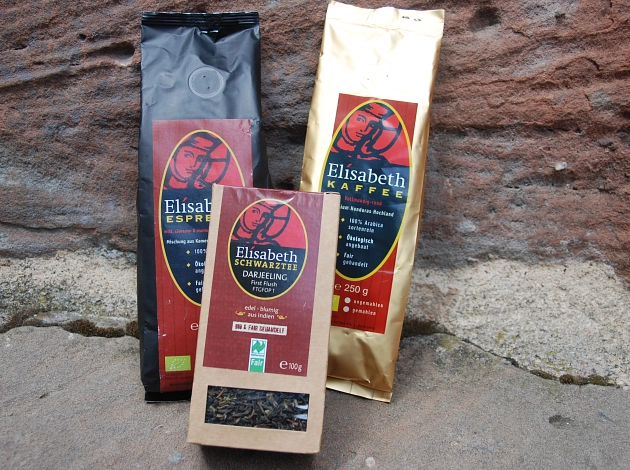 Foto der Packungen des Marburger Elisabeth Kaffees, Tees und Espressos